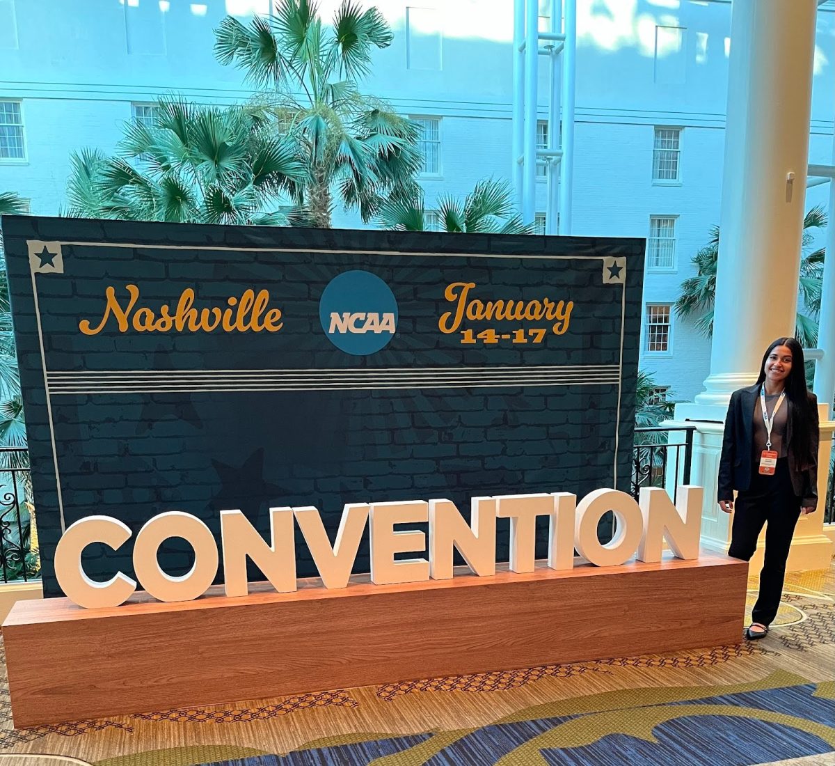 Juliana Vasquez posed at the NCAA Convention welcome sign