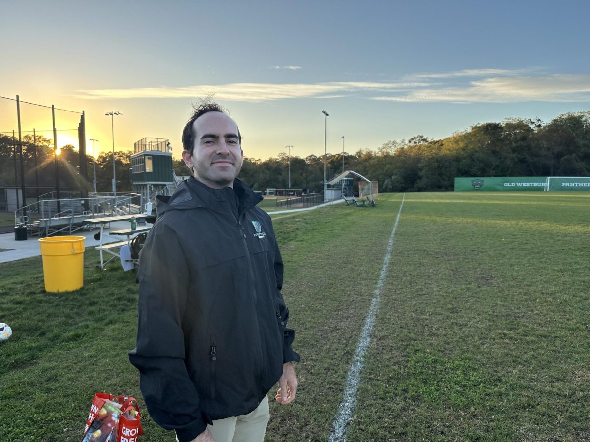 Ryan Duffy, assistant athletic trainer at SUNY Old Westbury, watches over women’s soccer practice on October 21, 2025. PHOTO BY: ANNABELLA RUNYAN
