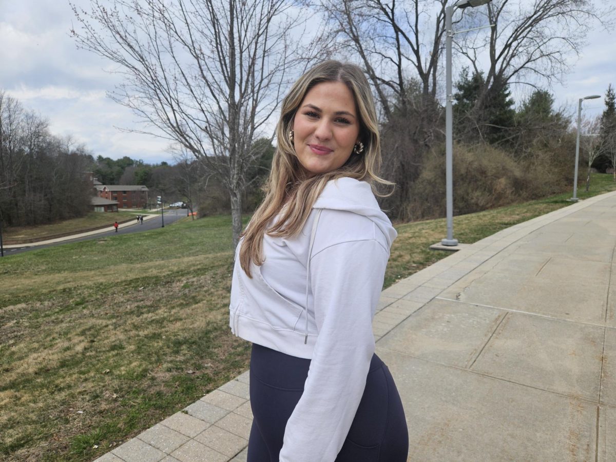 Despina Drakopoulis, an intern with The Catalyst, on SUNY Old Westbury campus grounds. April 1, 2026. PHOTO BY: EDEN IEVA
